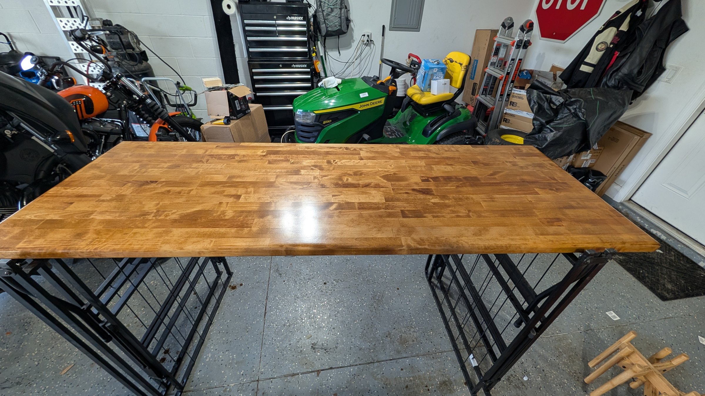 First six-foot desk section curing under polyurethane in the garage