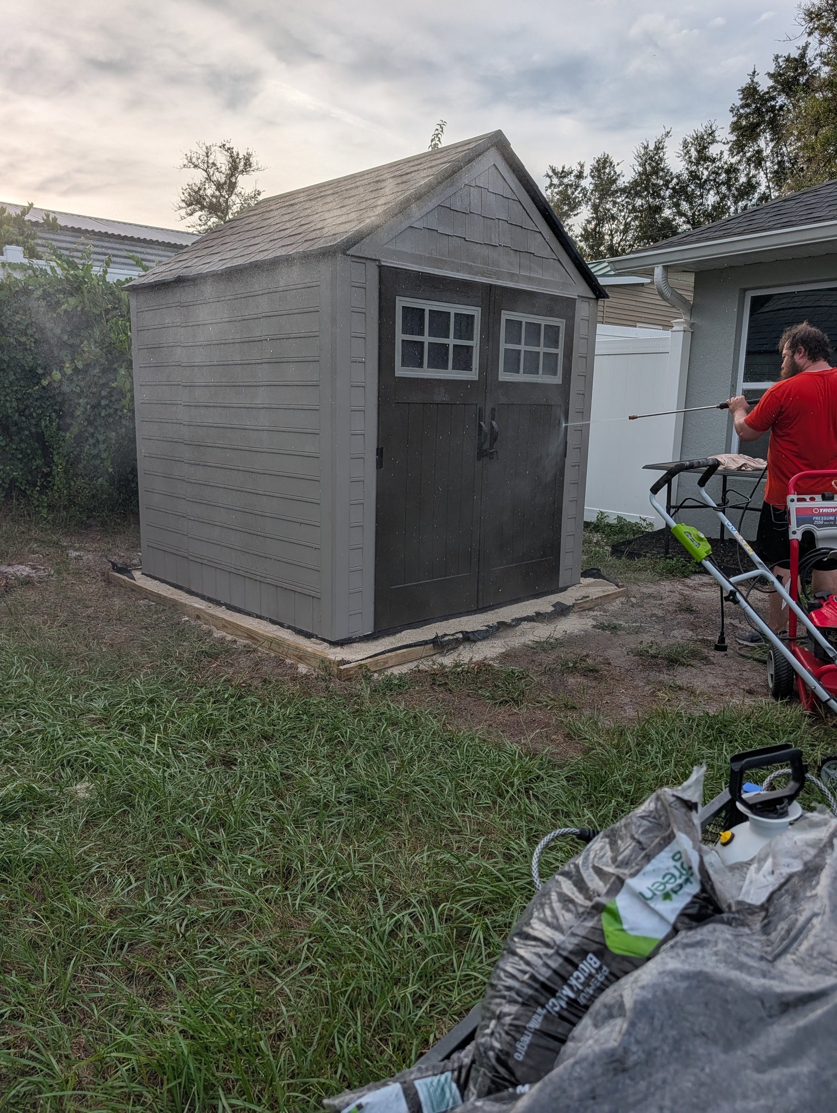 Side view of the rebuilt shed on its prepared base